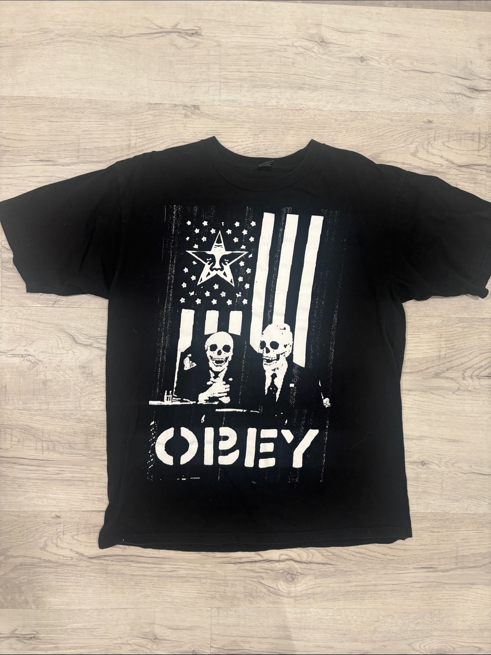 Obey Black Tee with White Skeleton Flag Graphic